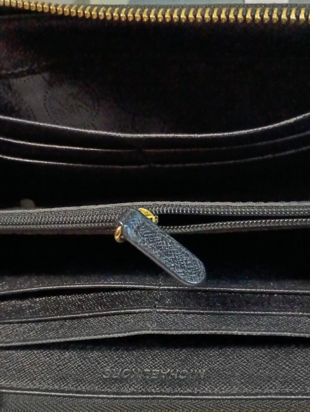 Michael Kors Black Zip-Around Saffiano Wallet with Gold Logo